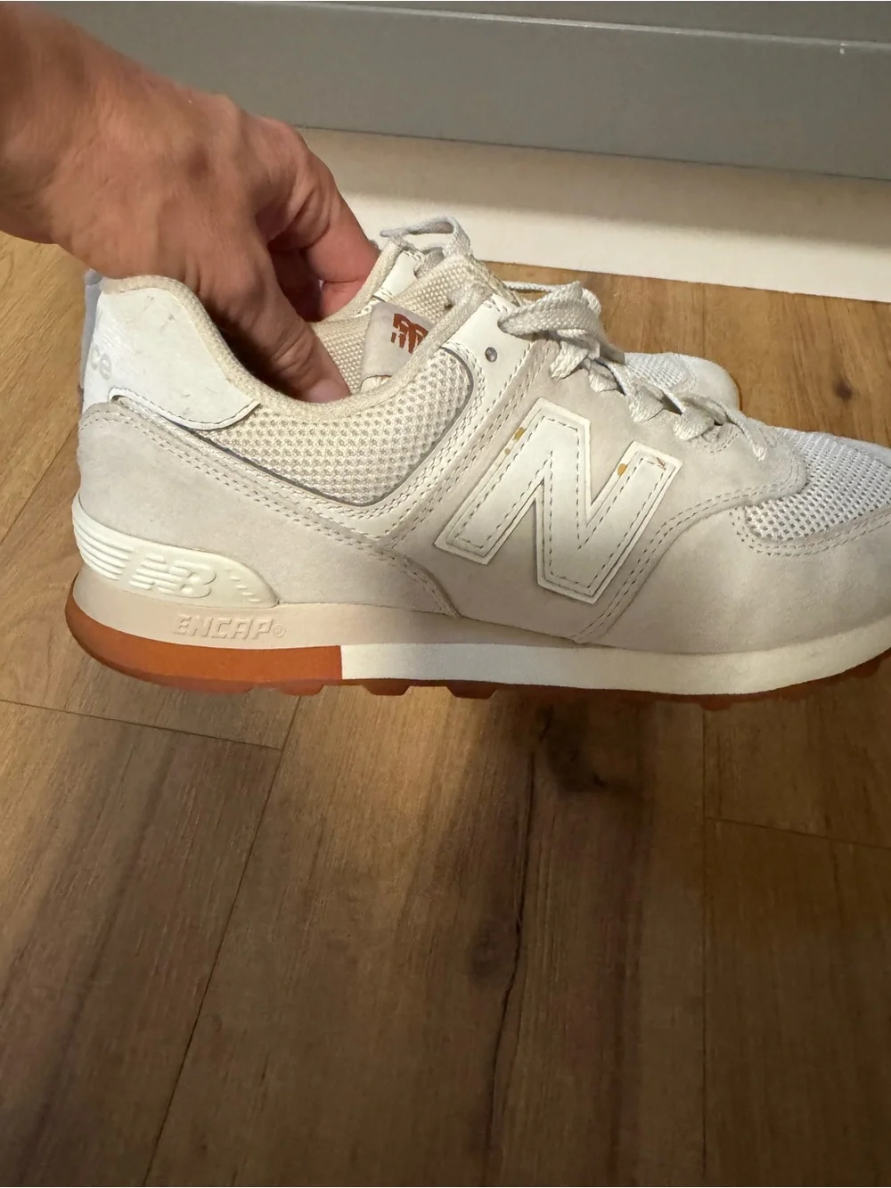 New Balance 574 Women's Cream Lace-Up Sneakers with Orange Accent